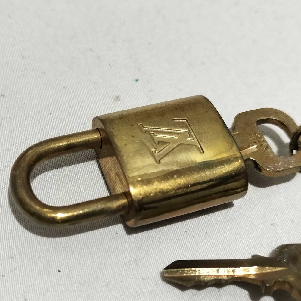 Authentic Louis Vuitton Brass Lock with Key #319